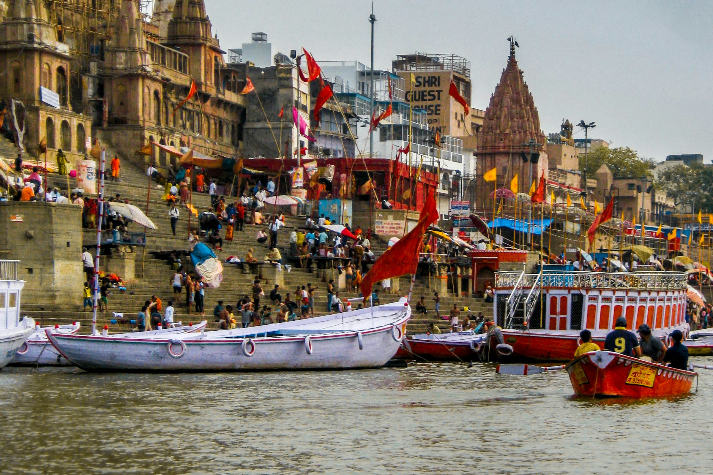 Boats beside the temples and riverside ghats of Varanasi