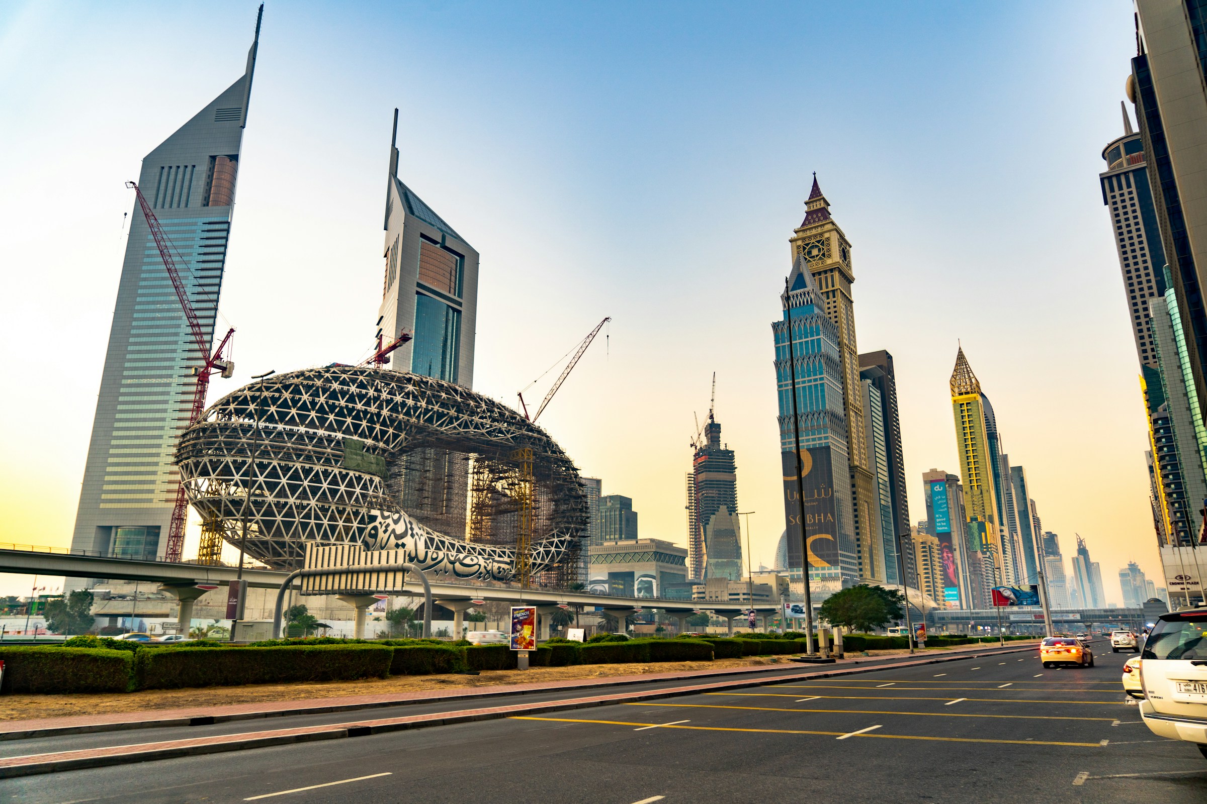 Modern architecture and towers along a Dubai boulevard