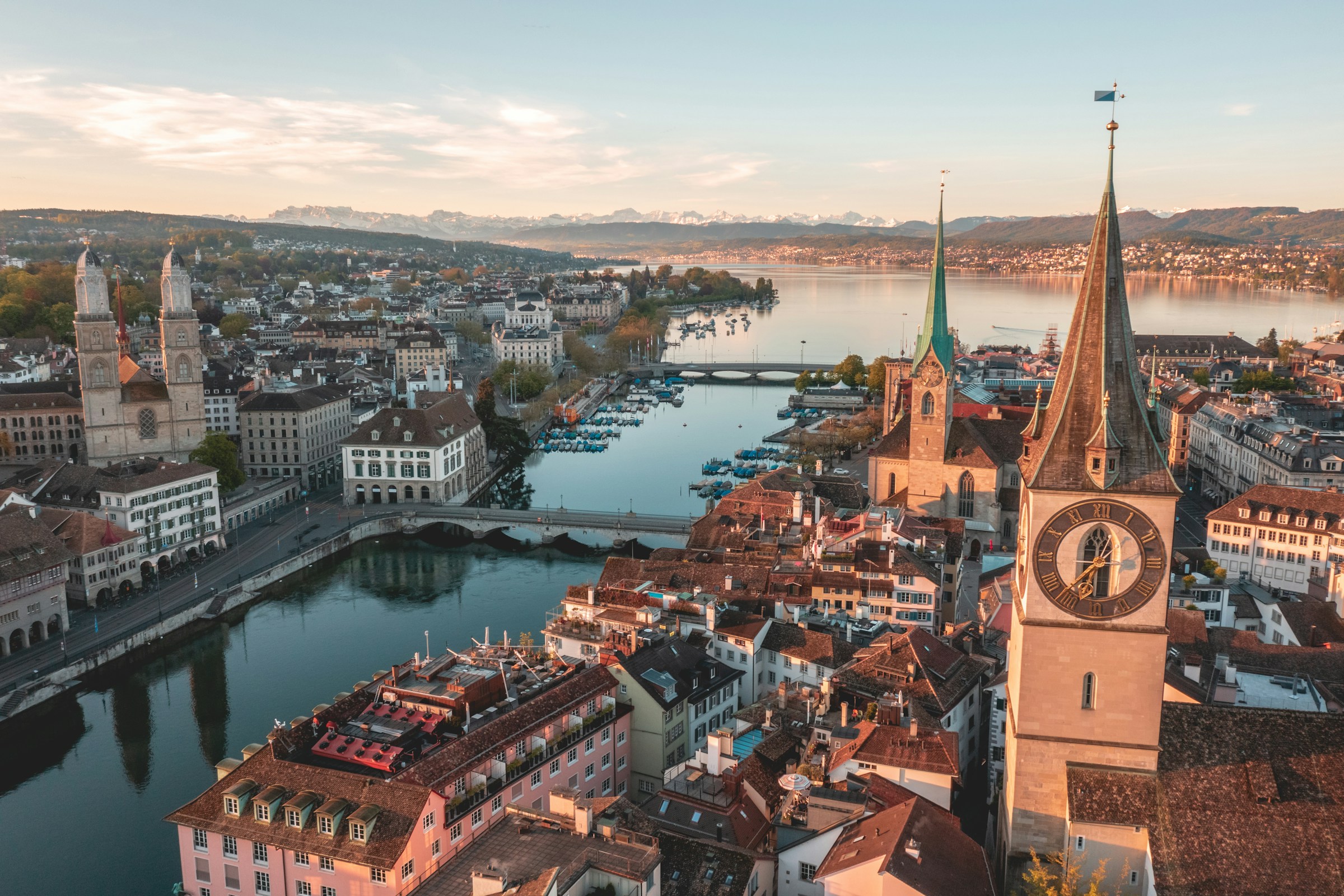 Historic rooftops and a blue river in Zurich