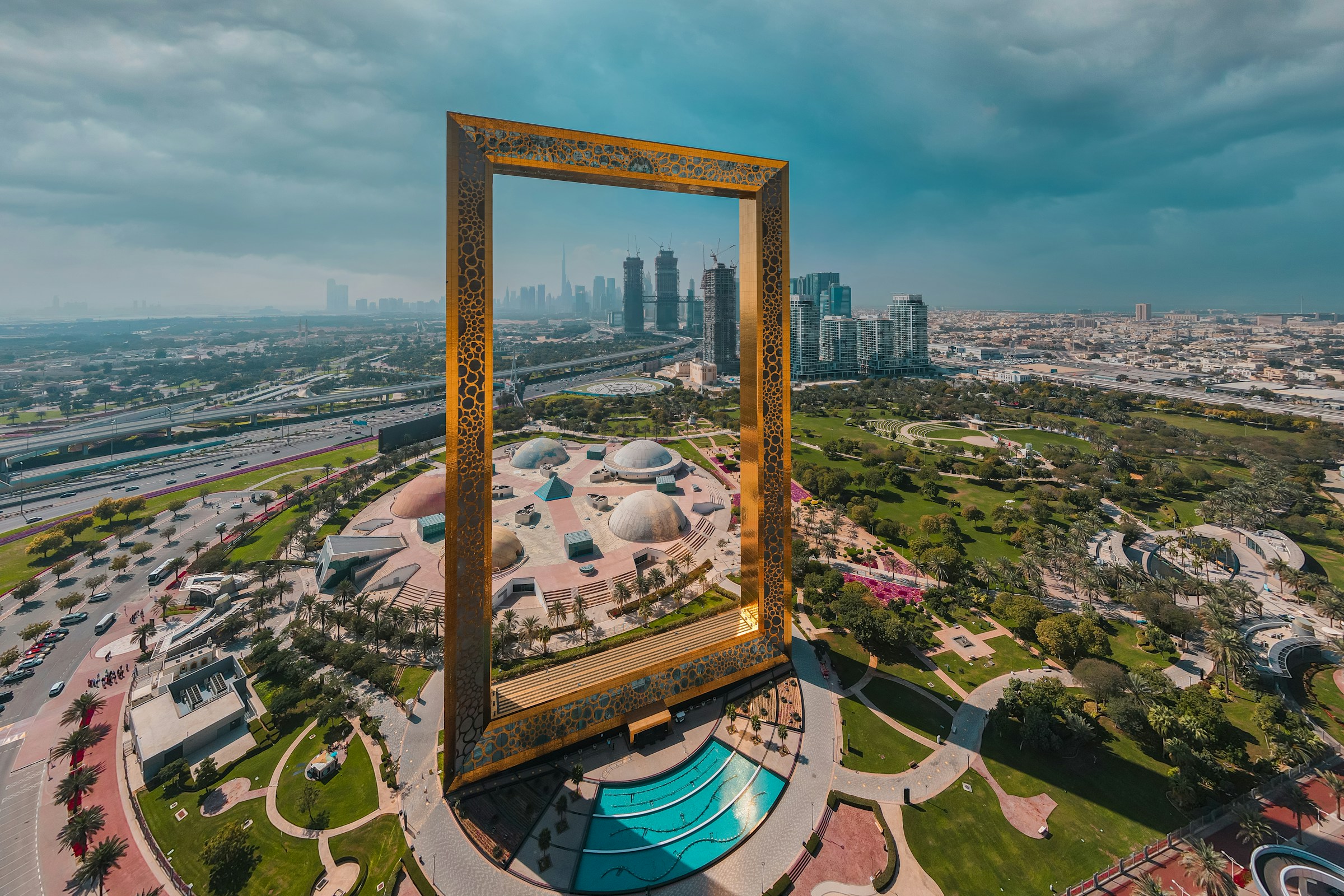 The Dubai Frame rising above gardens and the city